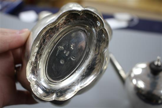 An Edwardian silver bachelors? teapot, A&J Zimmerman, Birmingham, 1903 and an 800 standard planished sugar bowl, gross 7oz.